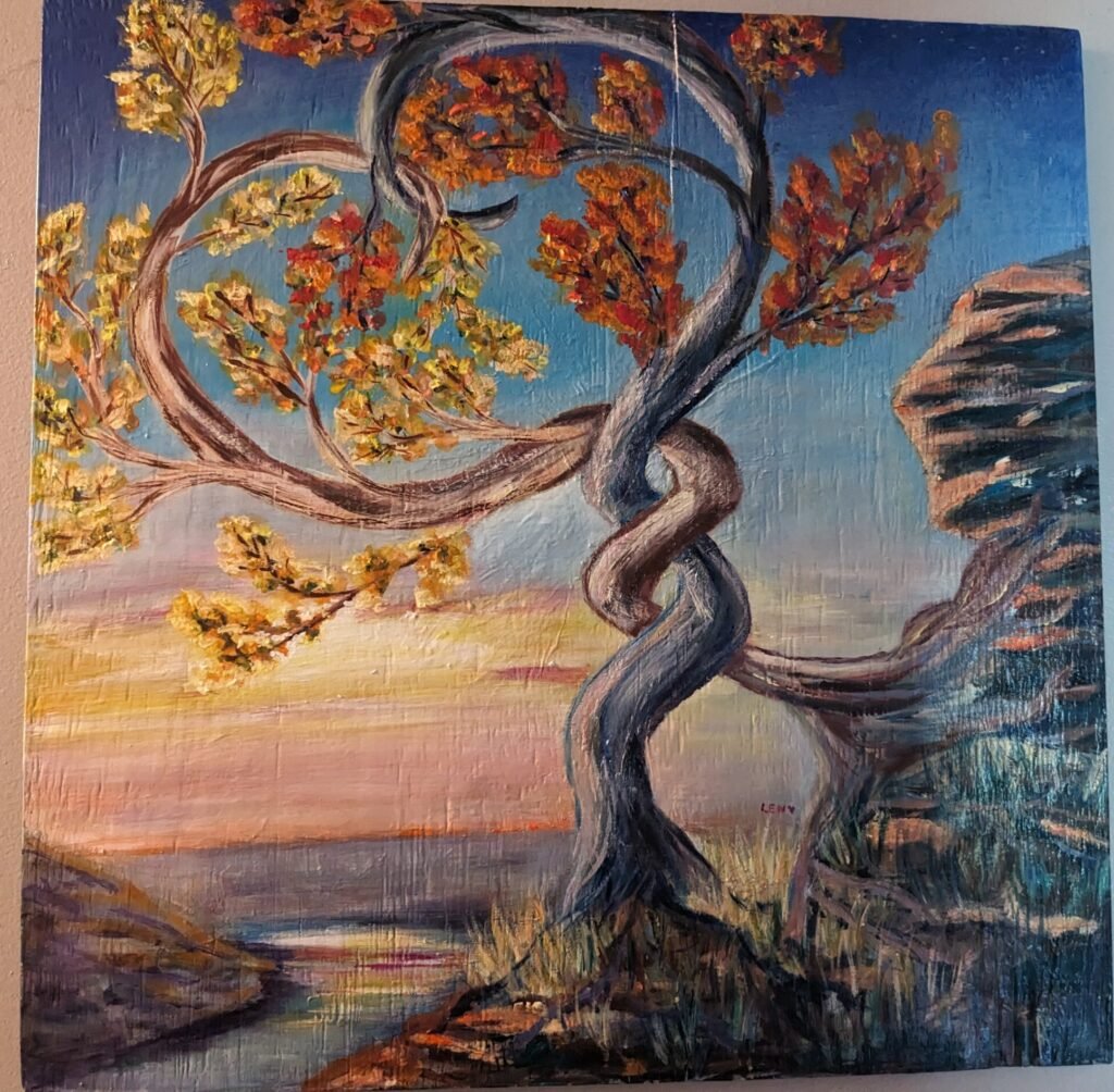Acrylic painting of two trees growing from a rock in autumn.